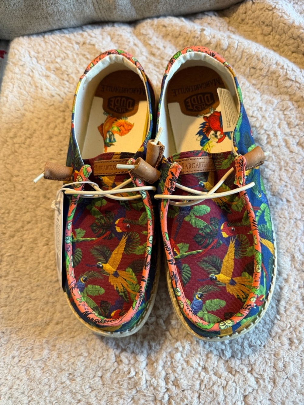 Hey Dude Parrot Print Slip-Ons in Red, Yellow, Green, Blue